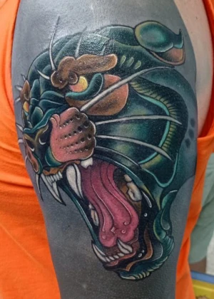 Pantera newtradicional feita sobre blackout no lenk tattoo
